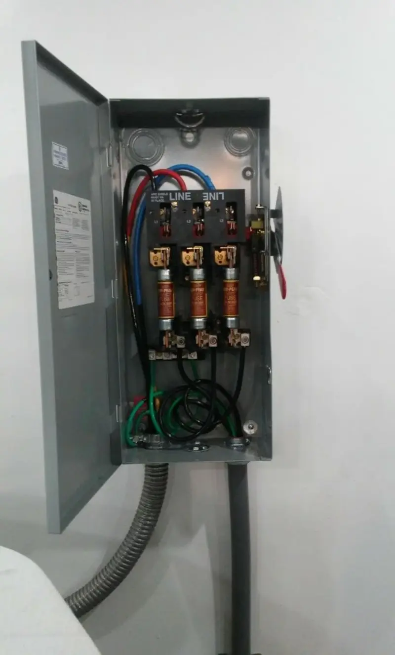 Three-phase disconnect switch installed for Smoke Detector Installation in Bright